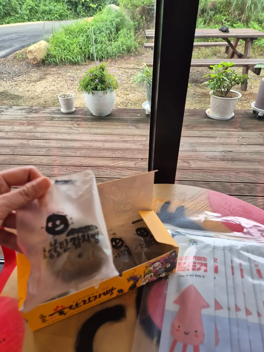Individually plastic-wrapped dark potato bread