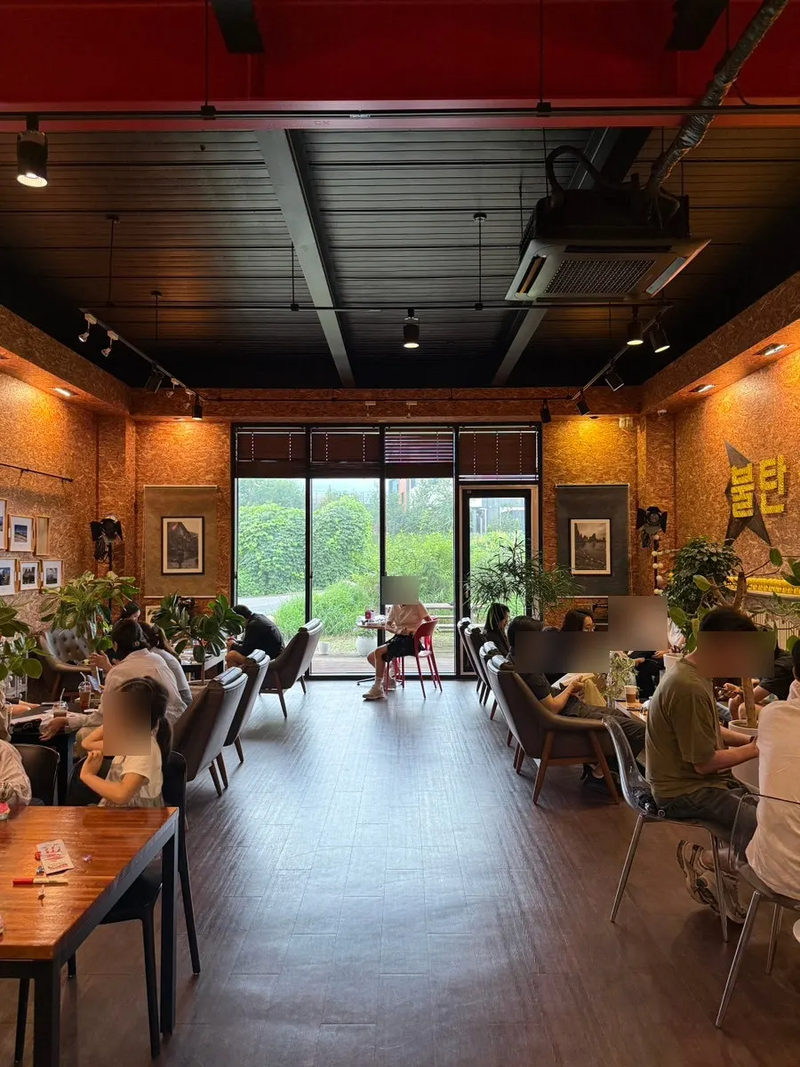 Interior and seating at Sokcho Bultan Gamja Bread Main Store