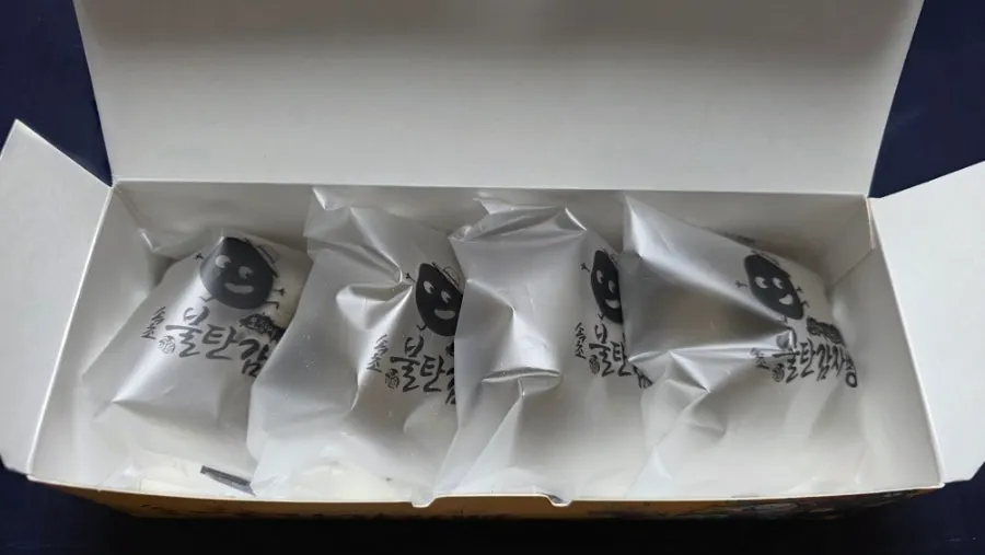 Box containing 4 potato breads