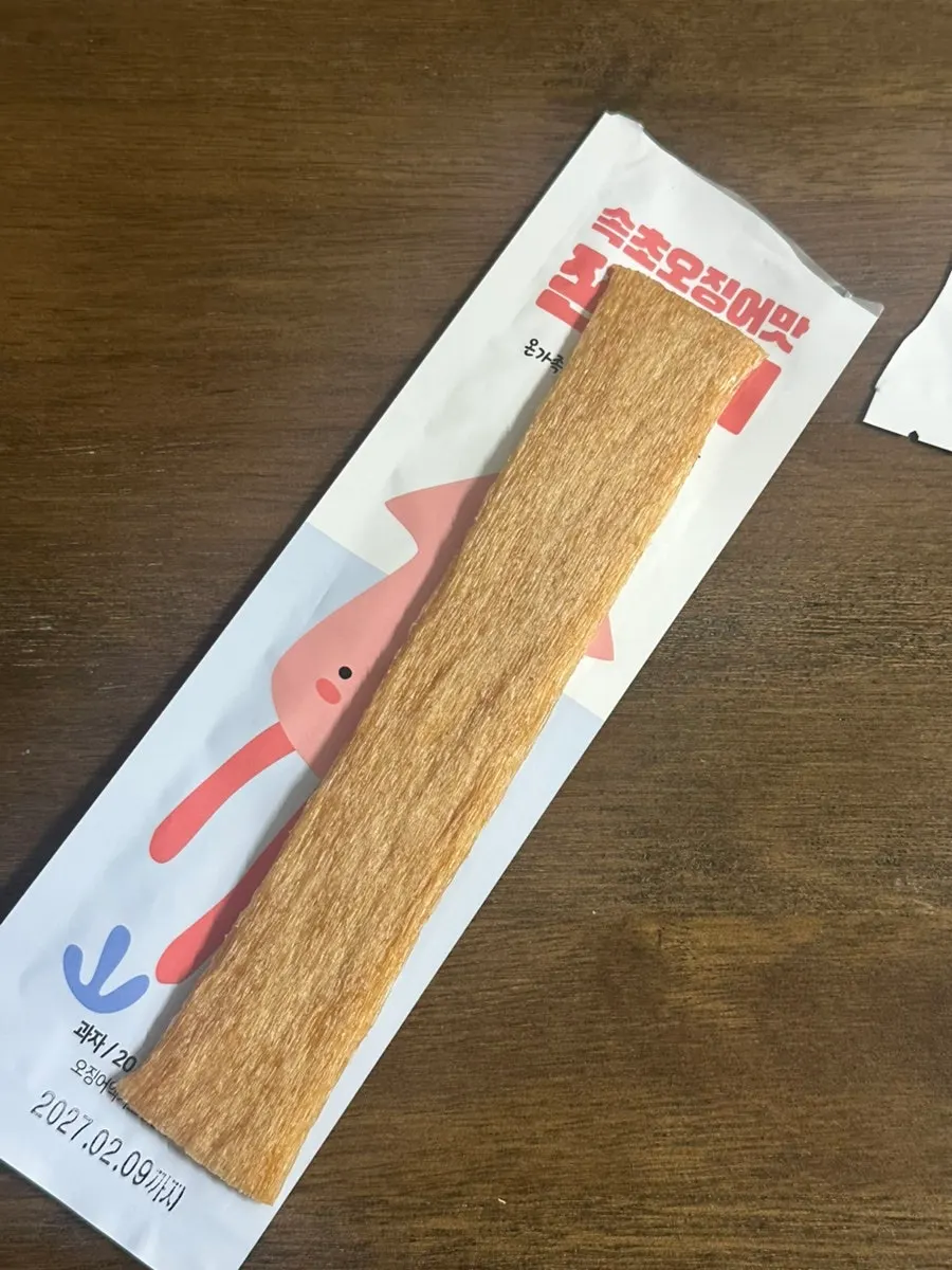 Squid jjondeugi held in hand