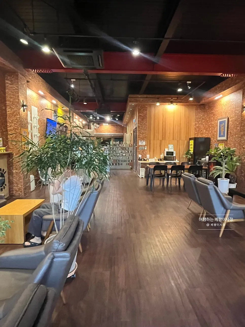 Seating and décor inside Sokcho Bultan Gamja Bread Main Store