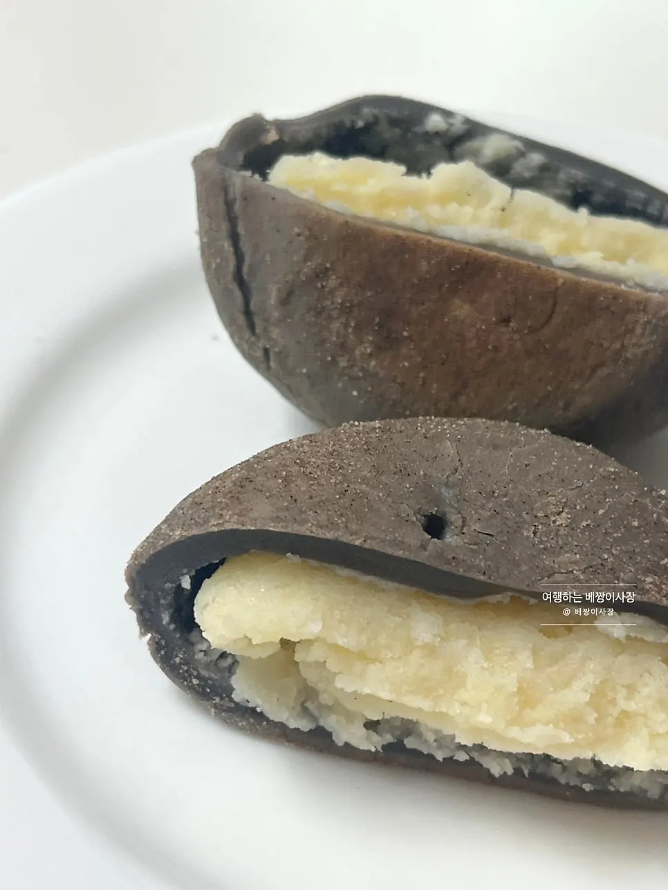 Cross-section showing chewy rice-cake shell packed with potato