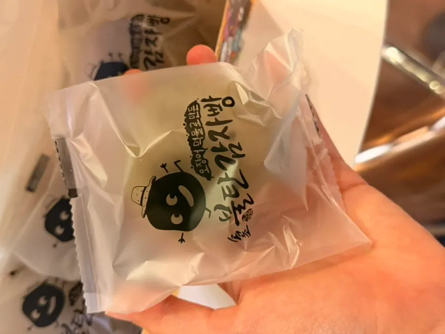 Sokcho jjondeugi placed next to the potato bread