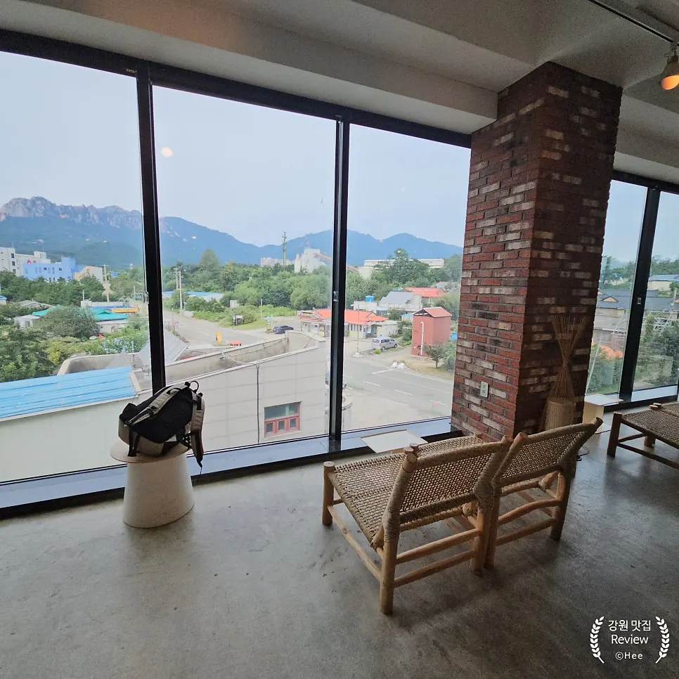 Spacious seating layout in Cafe Neorae's main hall