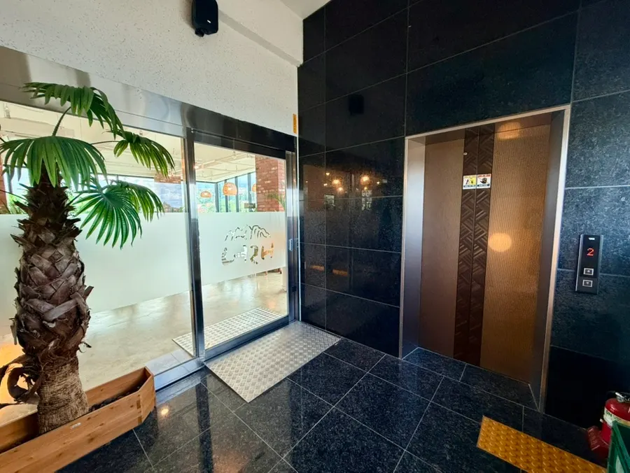 Interior of Cafe Neorae with a sundubu receipt discount notice