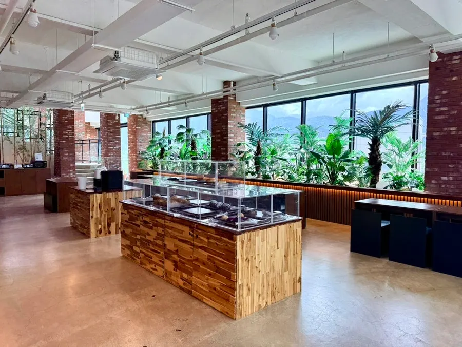Wide view of the spacious 2nd-floor seating at Cafe Neorae