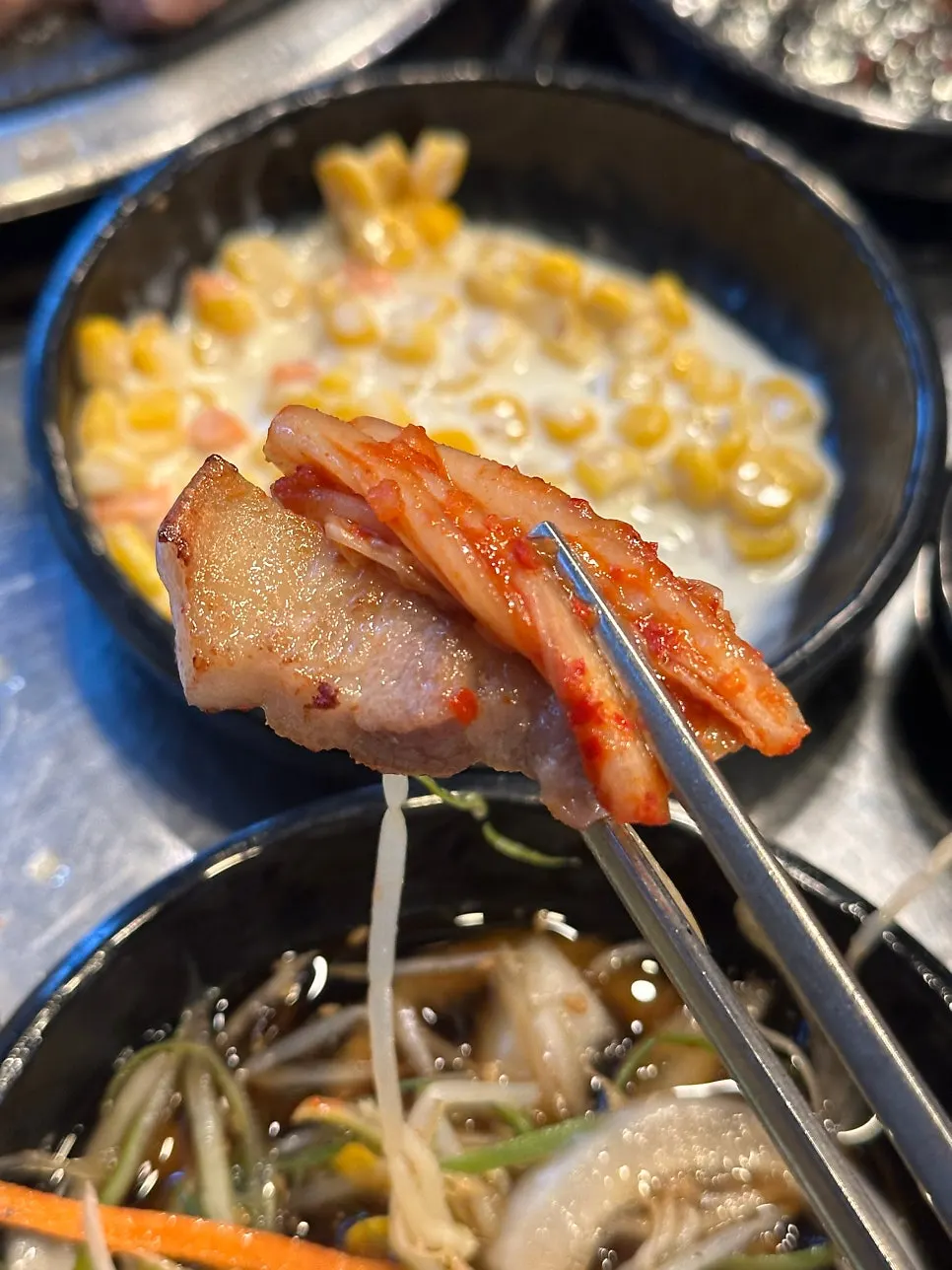 Pork belly and grilled kimchi on the grill plate