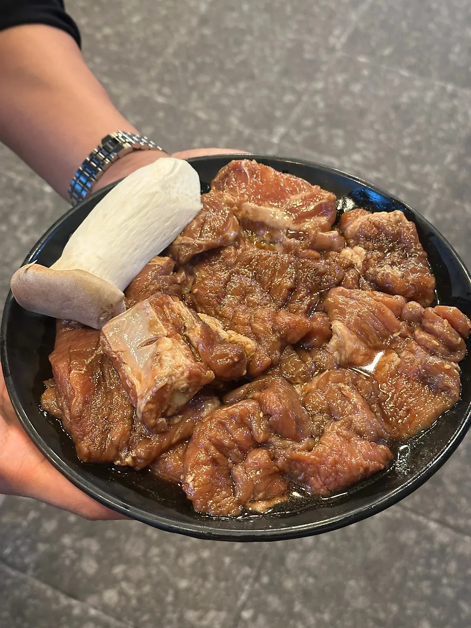 House-marinated pork ribs in sauce