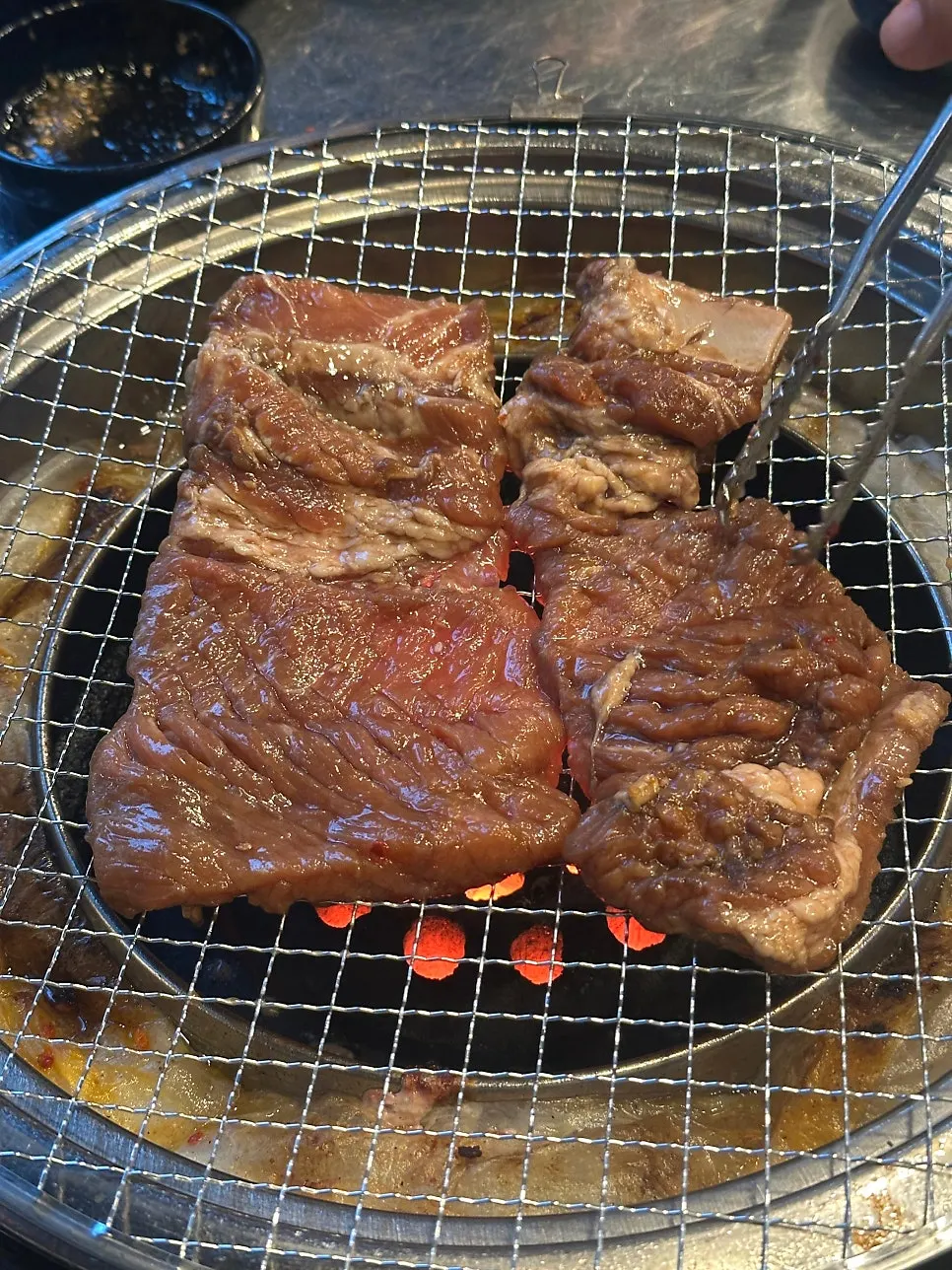 House-marinated pork ribs of irregular shapes