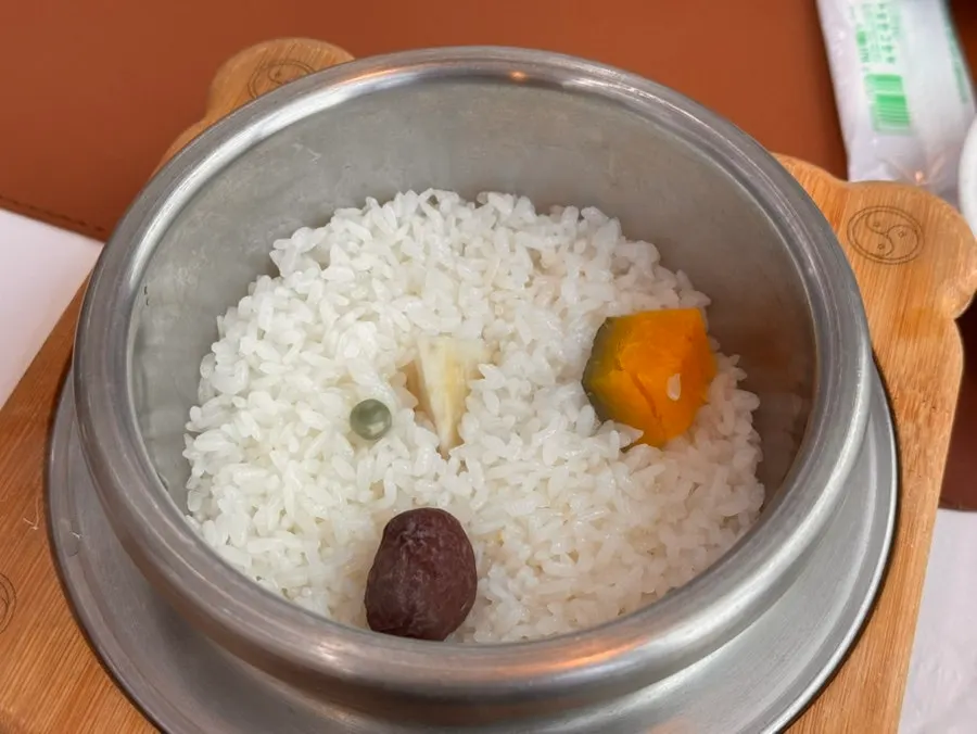 A spoonful of soft chodang sundubu