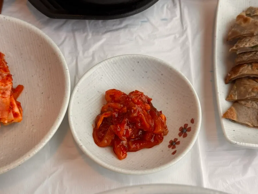 A nearly finished bowl of chodang sundubu