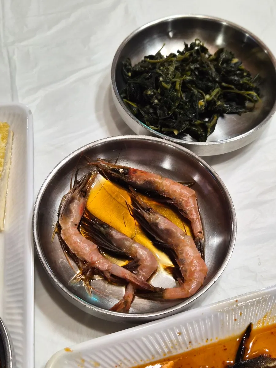 Table full of basic banchan at Daecheongmaru