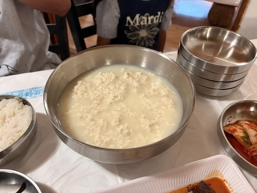 A meal of sundubu paired with side dishes