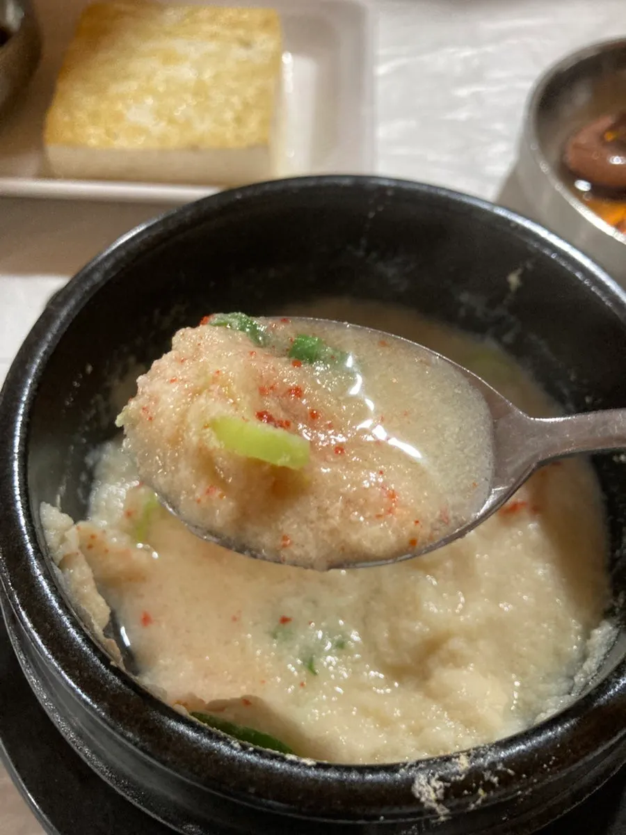 Two bowls of chodang sundubu shared between two people