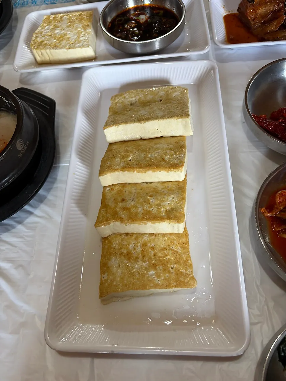 A plate of golden pan-fried tofu