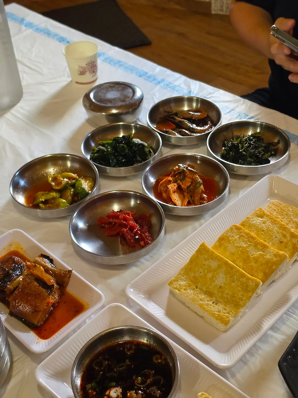Korean table spread with tofu dishes and side dishes together