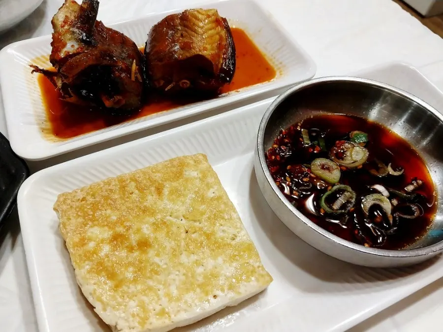 Sokcho-style braised kodari and pan-fried tofu side dishes