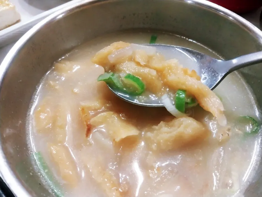 Yongdae-ri hwangtae haejangguk served alongside sanchae bibimbap