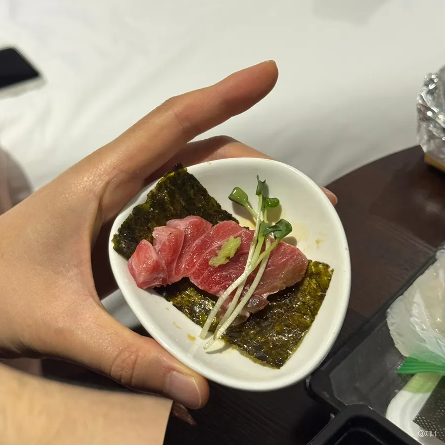 Tuna sashimi wrapped in seaweed