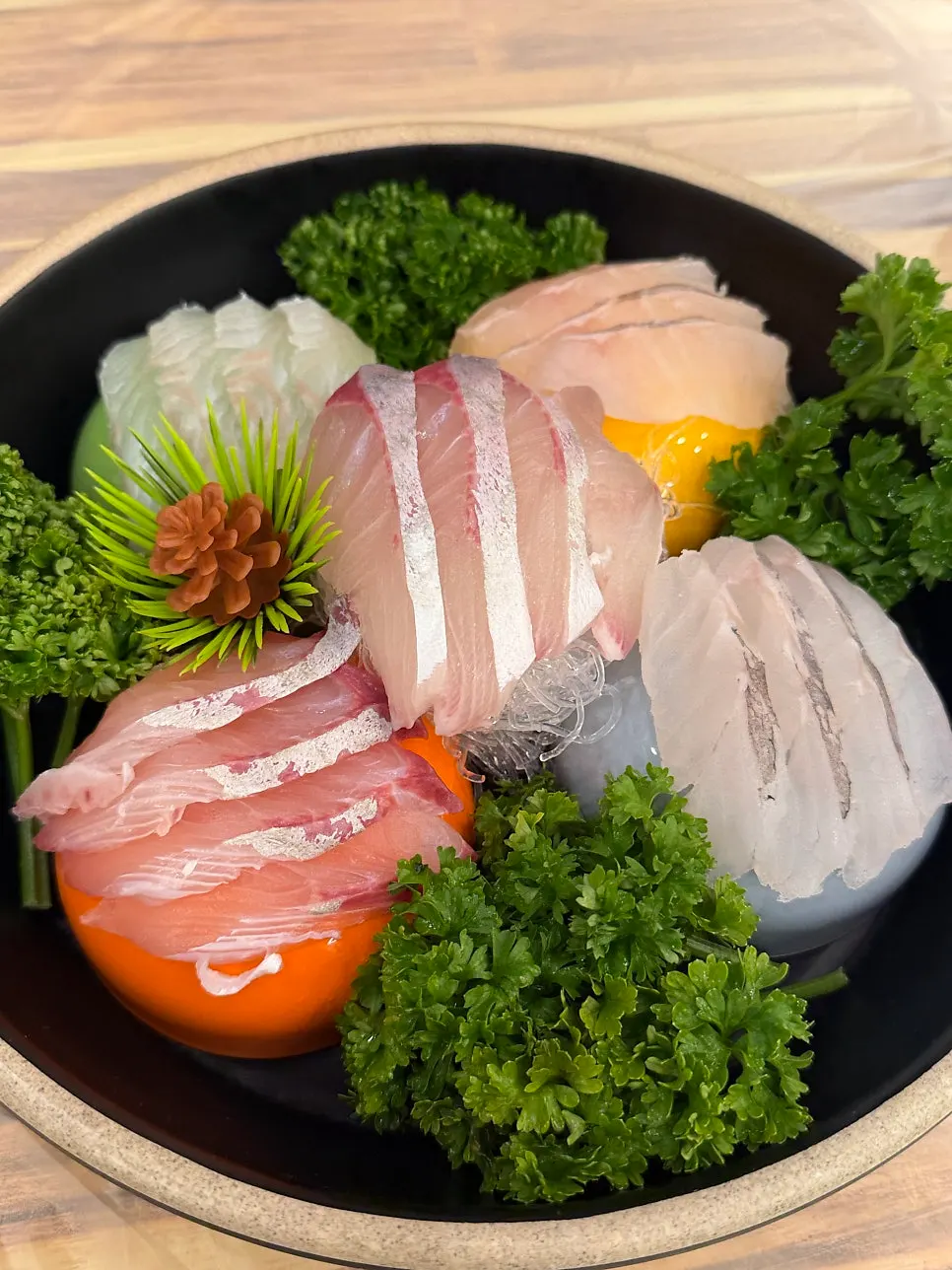 Feast beginning with assorted sashimi and seafood