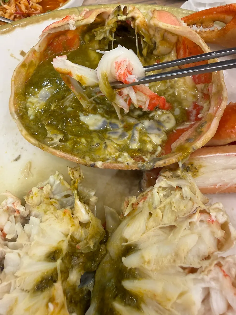 Snow crab meat dipped in innards