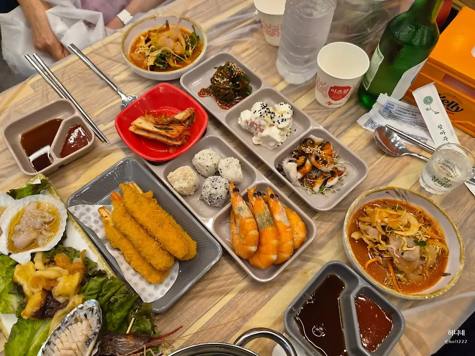 Generous side dishes served with soju
