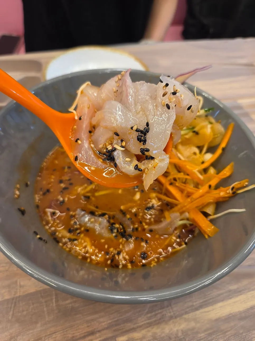 Live spot shrimp skewered and served still moving