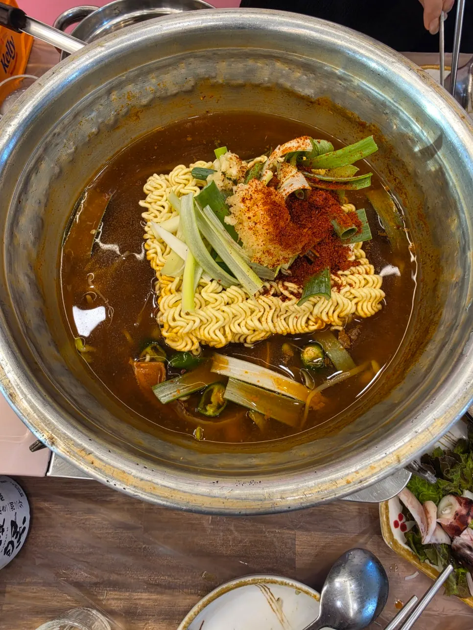 Red crab ramyeon with a whole red crab inside