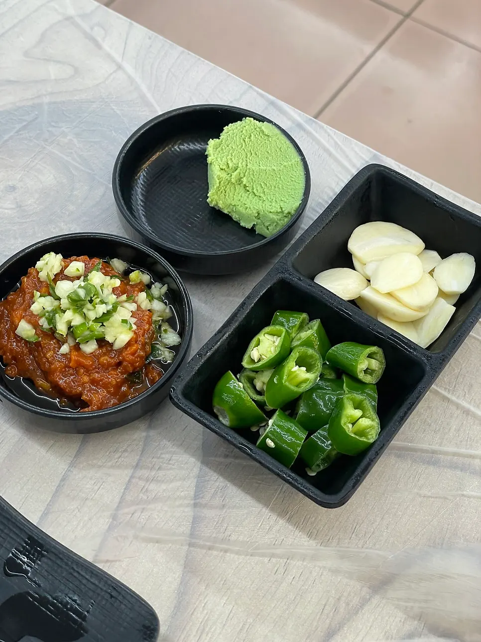 Assorted side dishes at a seafood restaurant