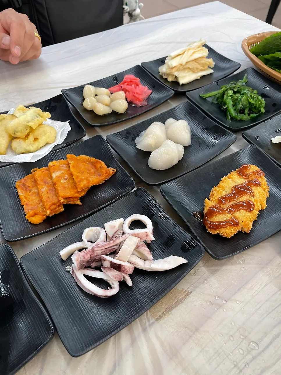 Assorted side dishes for a meal with a child