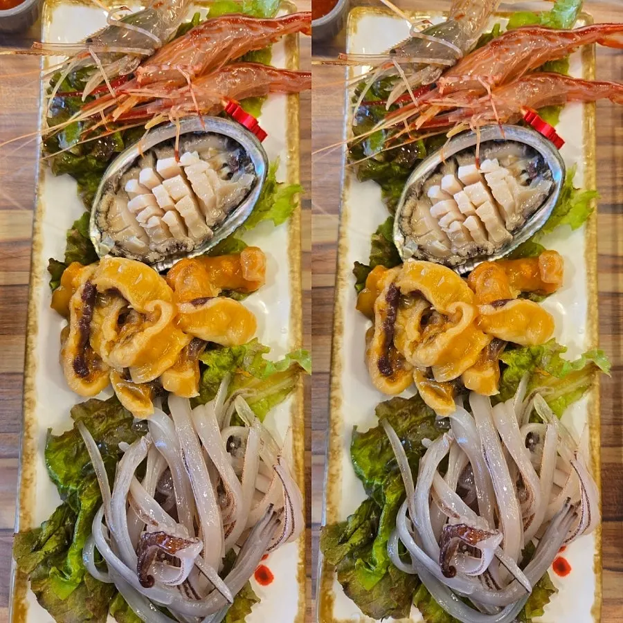 Plate of squid, sea squirt, abalone, and spot shrimp