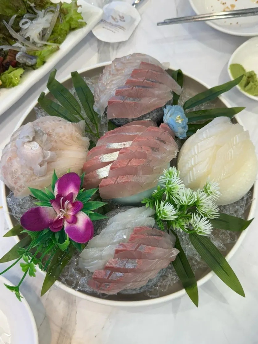 Seasonal wild mixed sashimi platter on a large plate