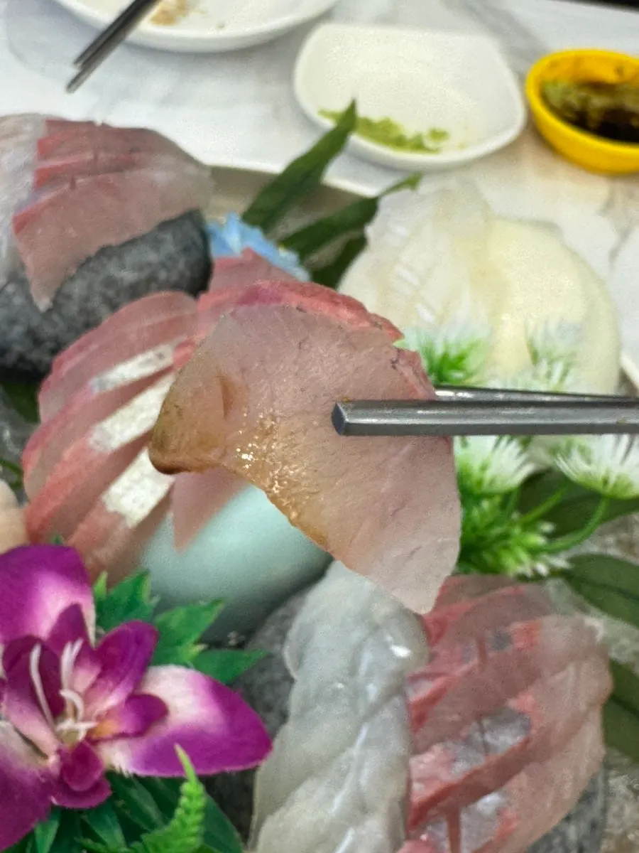 A thick-cut piece of wild sashimi