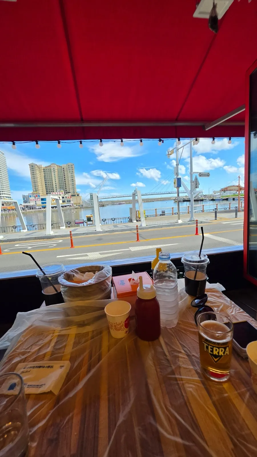 Window seat looking out at Daepo Port's sea
