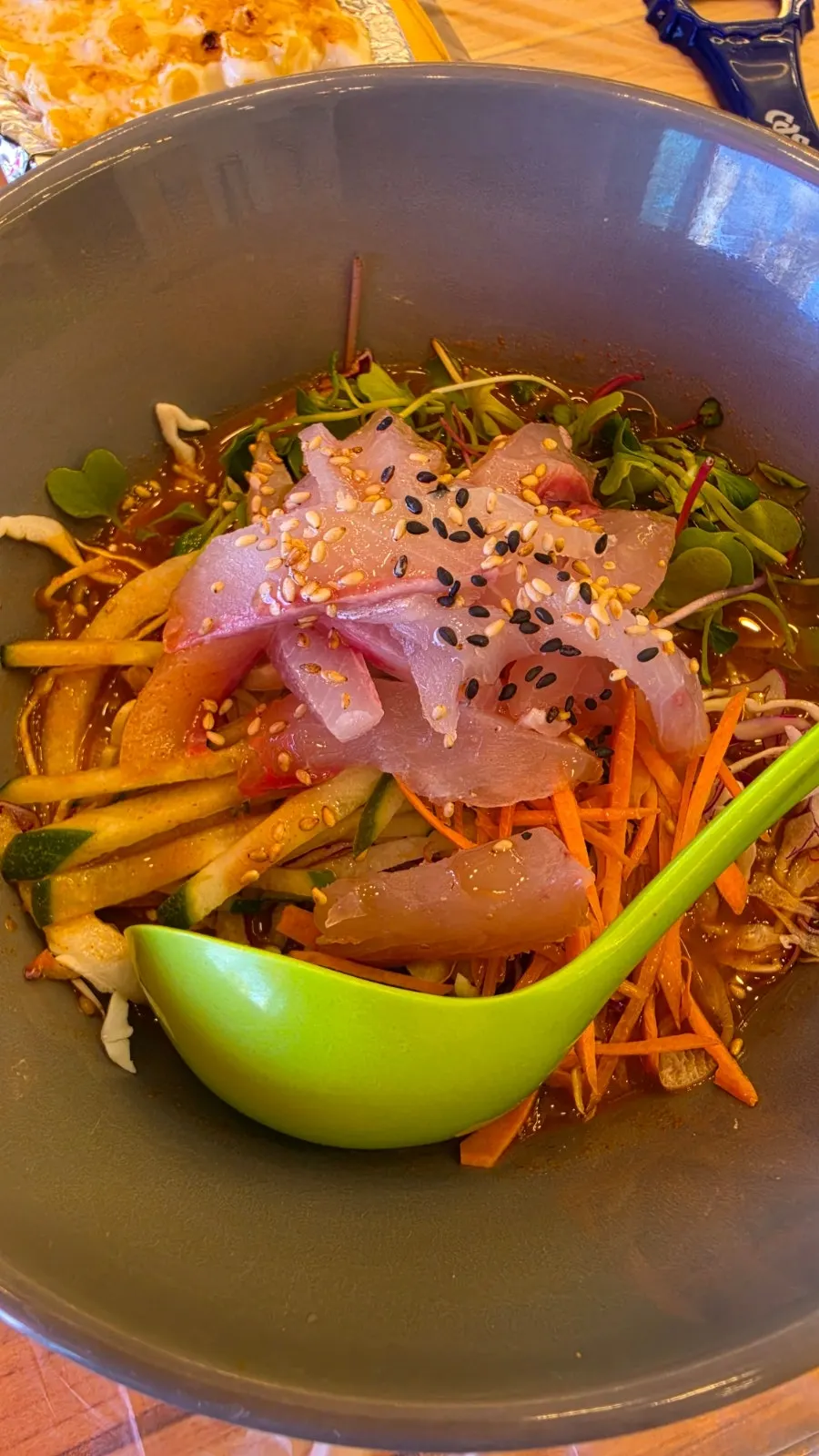 A bowl of tangy, sweet mulhoe (cold raw fish soup)