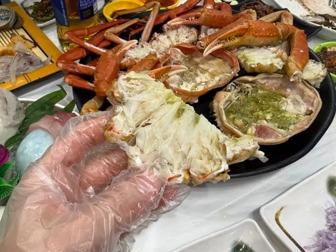 Snow crab body meat cut in half for serving