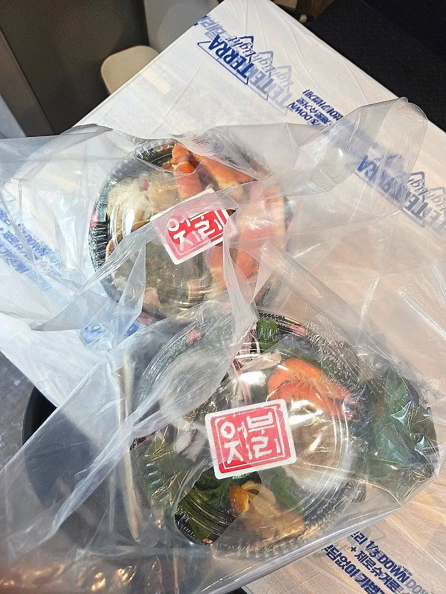 Container prepped for the takeout snow crab and sashimi set