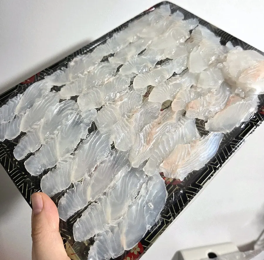 Plate of translucent flounder sashimi