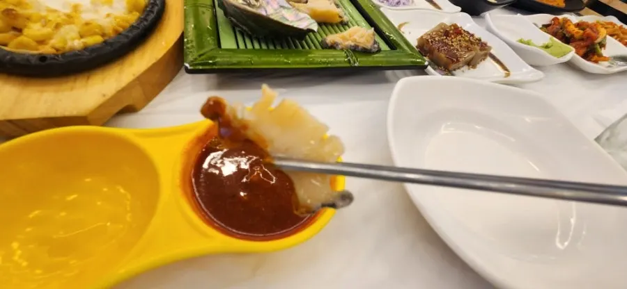 Plump live squid sashimi