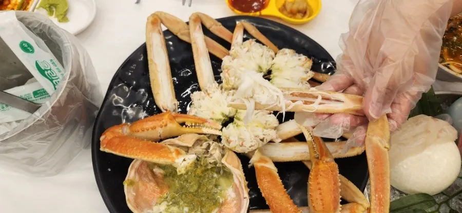 Prepped snow crab legs and claw