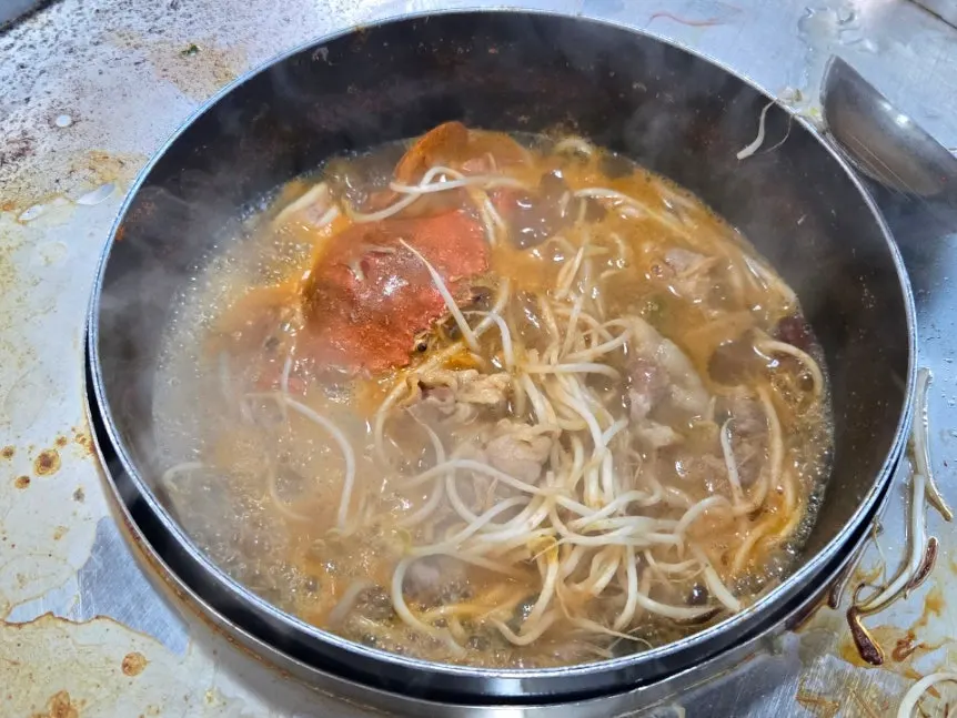 Seafood lightly cooked and lifted out to eat