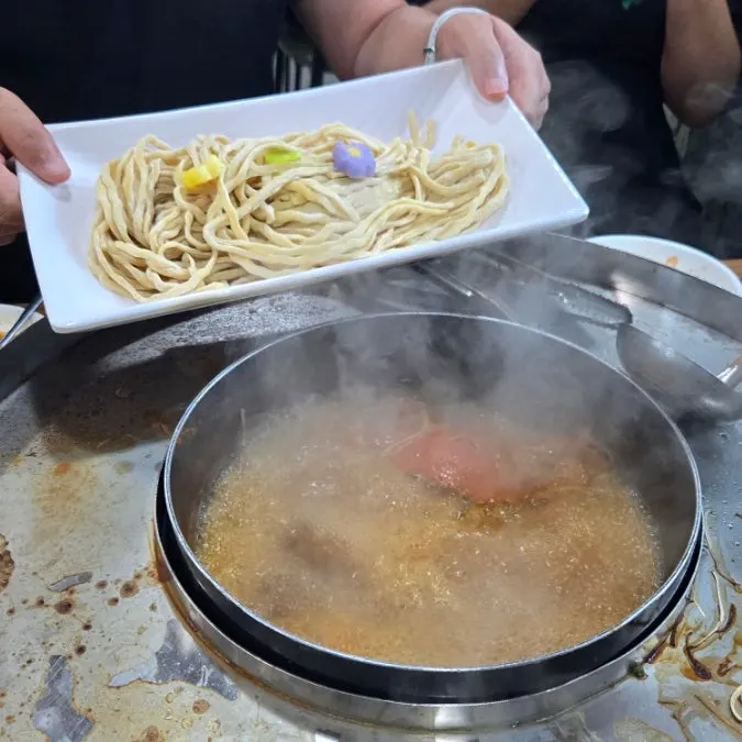 Jangkalguksu with house-made fresh noodles added