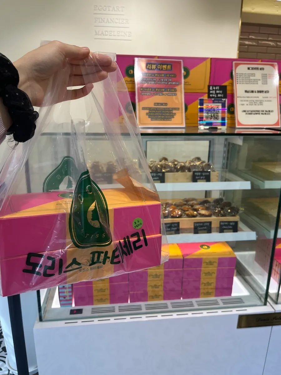 Two boxes of egg tarts picked up from the bakery