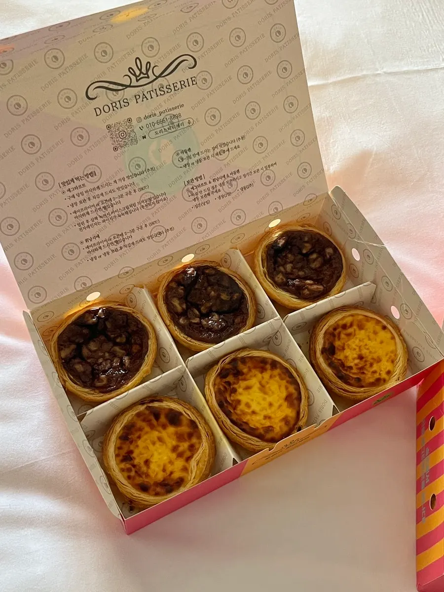 A box of walnut and cream cheese egg tarts