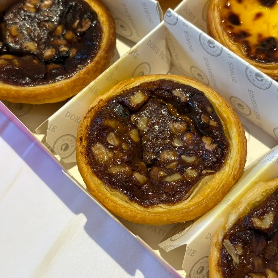 Egg tart topped with walnuts