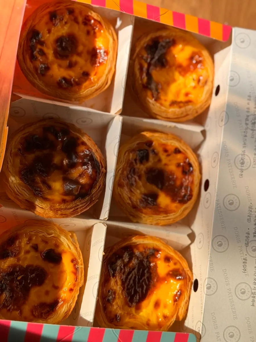 Vertical shot of Doris Patisserie's egg tart