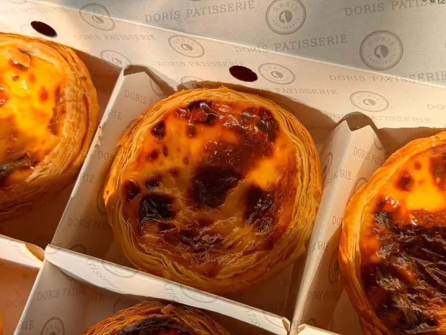 Cross-section of the egg tart showing crisp layers