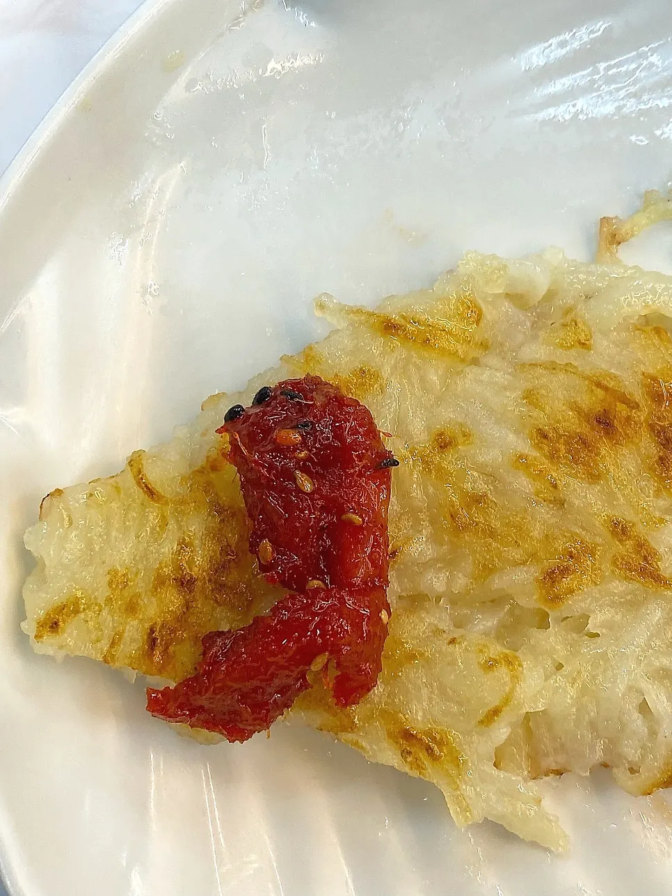 Potato pancake served with makguksu