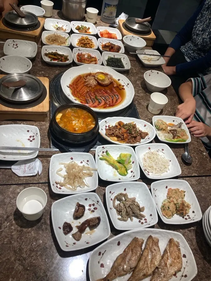 Korean set meal served with a variety of side dishes