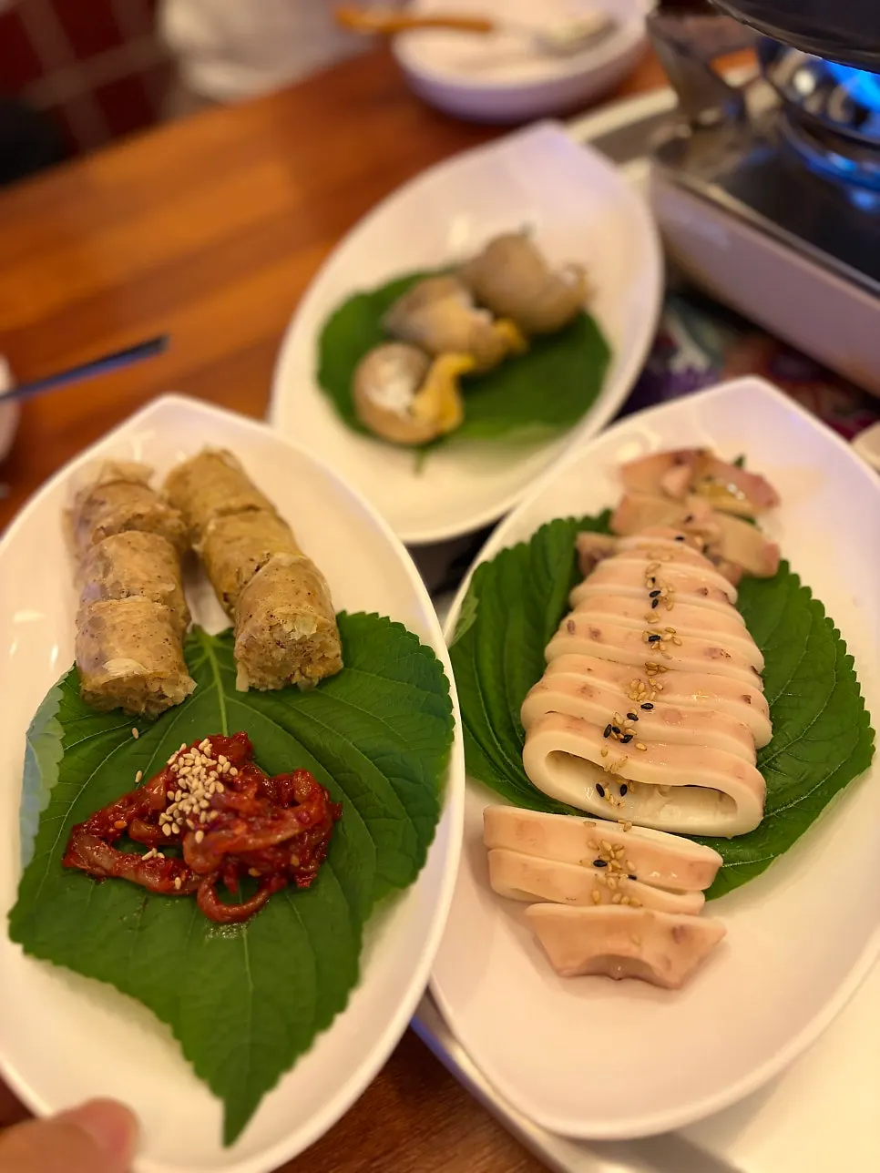 Warm boiled pork served with minari